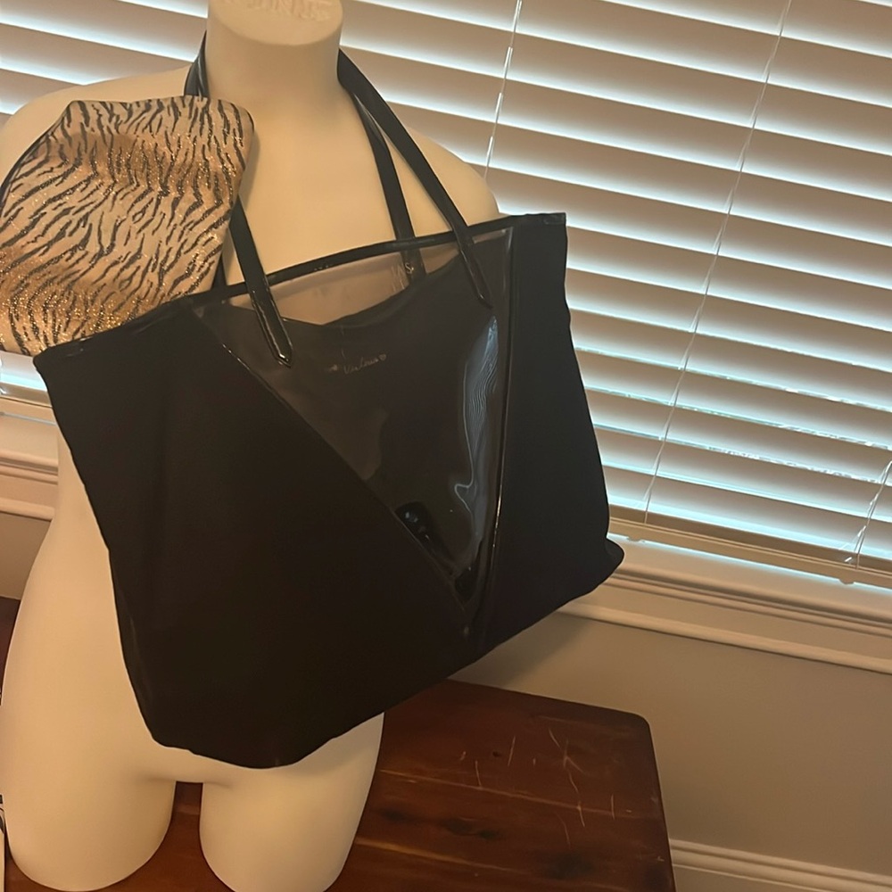 Victoria’s Secret tote with attached cosmetic bag.